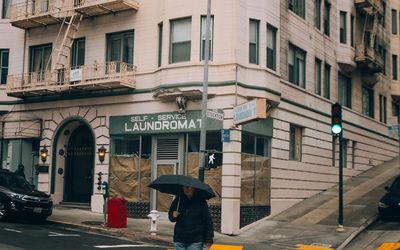 Abstract flowing lines in light blue and dark grey.